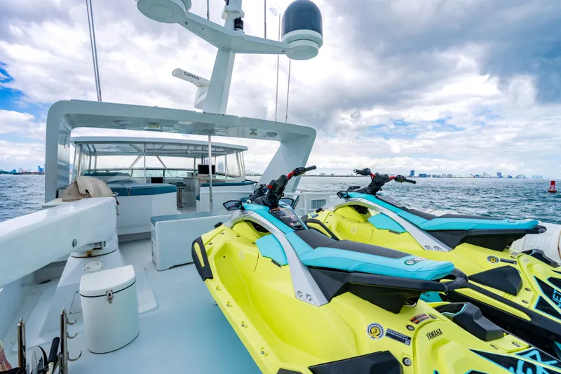 Slide: The Image of Luxury yacht deck with jet skis, Broward Raised Pilothouse, 2006 model, ocean view. - 33