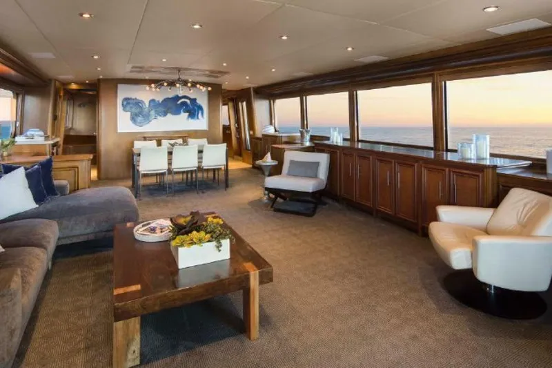 Slide: The Image of Luxurious 2006 Broward Raised Pilothouse yacht interior with elegant seating and ocean views. - 4