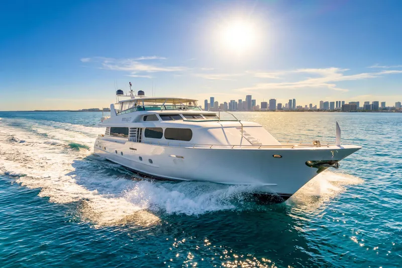 Slide: The Image of Luxurious 2006 Broward Raised Pilothouse yacht cruising on sunny ocean waters. - 42