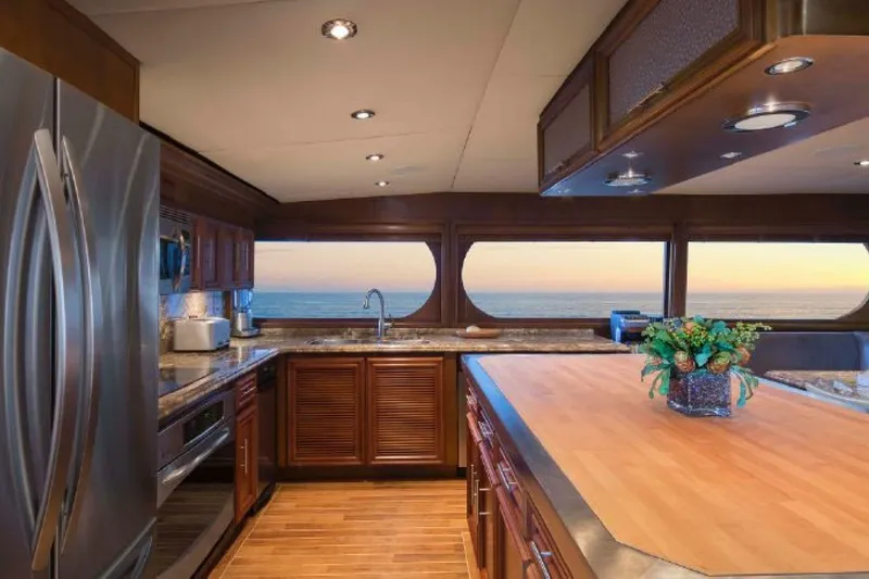 Slide: The Image of Luxurious kitchen interior on 2006 Broward Raised Pilothouse yacht with ocean view. - 6