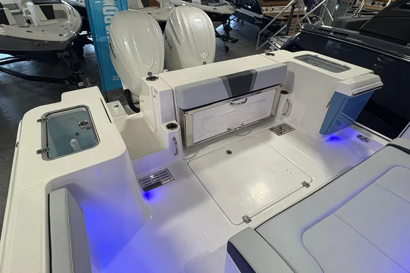 Slide: The Image of 2026 Robalo R300 Center Console boat interior with seating and storage compartments. - 11