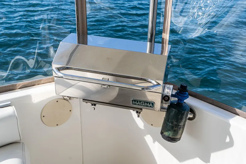 Slide: The Image of Stainless steel grill on 1998 Sea Ray 420 Aft Cabin boat, overlooking water. - 19