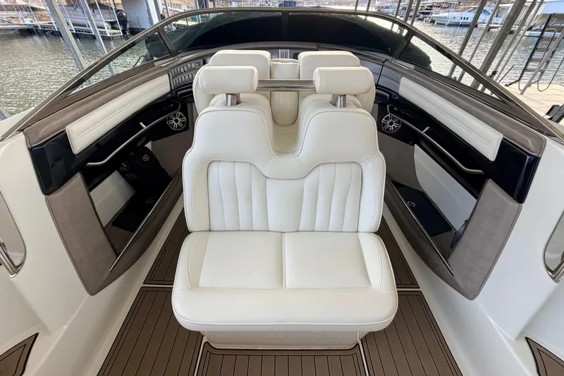 Slide: The Image of Luxury interior of 2004 Cobalt 343 boat with white leather seating. - 38