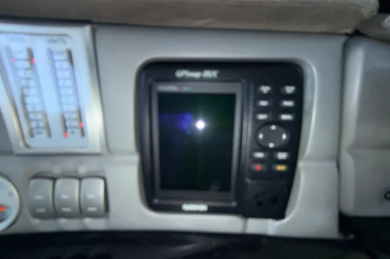 Slide: The Image of Dashboard of a 2004 Cobalt 343 with electronic display and controls. - 45