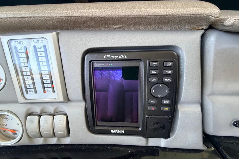 Slide: The Image of 2004 Cobalt 343 dashboard with Garmin GPSmap 182C navigation system. - 46