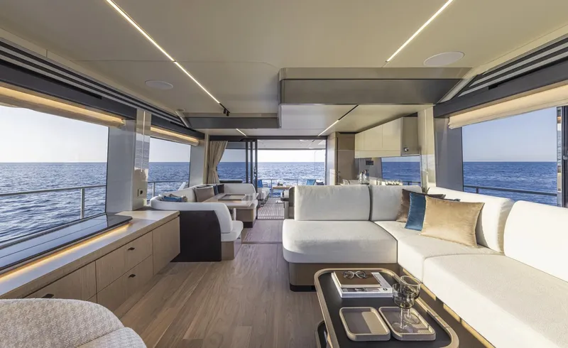Slide: The Image of Luxurious interior of 2025 Absolute 60 Fly Co Ownership yacht with ocean view. - 9
