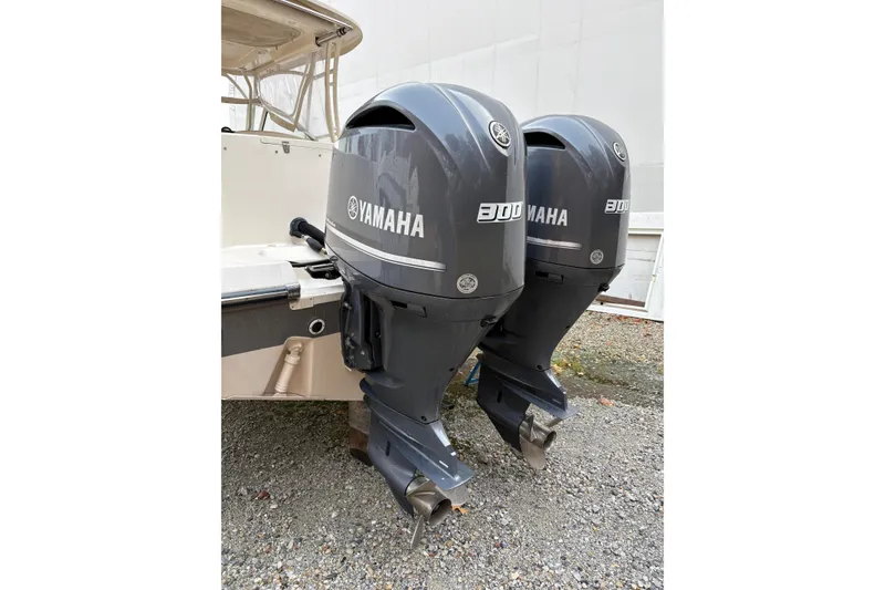Slide: The Image of Twin Yamaha 300 outboard engines on a 2017 Grady-White Freedom 307 boat. - 5