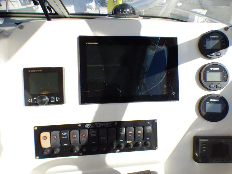 Slide: The Image of Control panel of 2016 Sea Fox 256 Voyager boat with navigation and monitoring systems. - 20