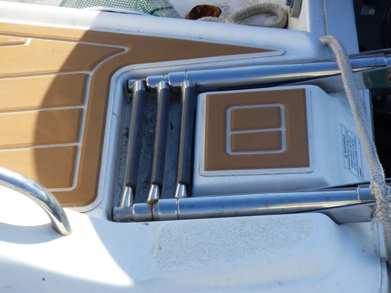 Slide: The Image of 2016 Sea Fox 256 Voyager boat ladder and deck detail. - 32
