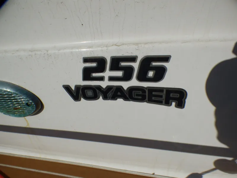 Slide: The Image of Sea Fox 256 Voyager 2016 model nameplate on boat exterior. - 37