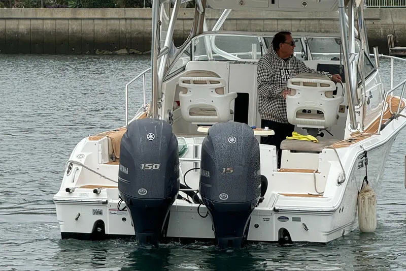 Slide: The Image of 2016 Sea Fox 256 Voyager boat with dual Yamaha engines on water. - 7