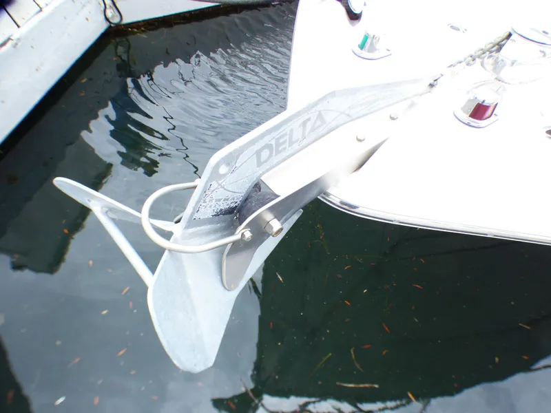 Slide: The Image of Anchor of 2004 Robalo R265 Walkaround boat in water. - 12