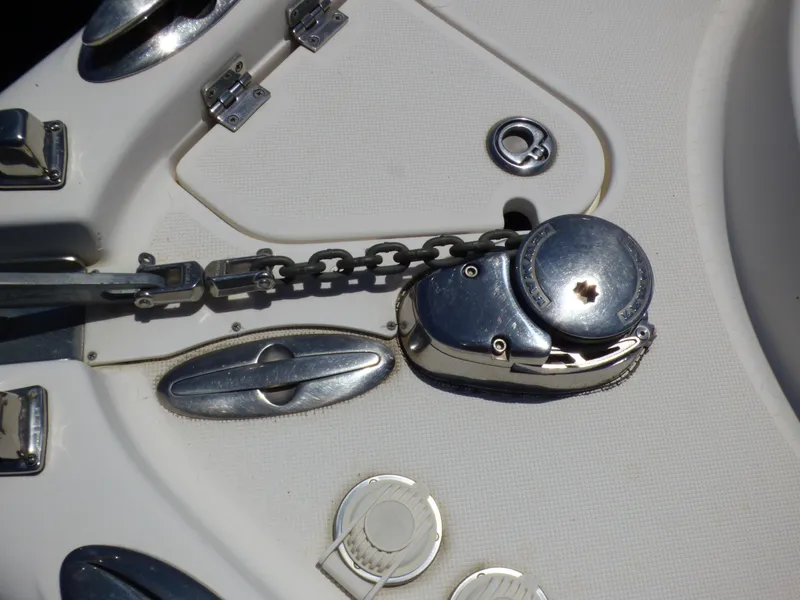 Slide: The Image of 2004 Robalo R265 Walkaround boat anchor chain and winch detail. - 13