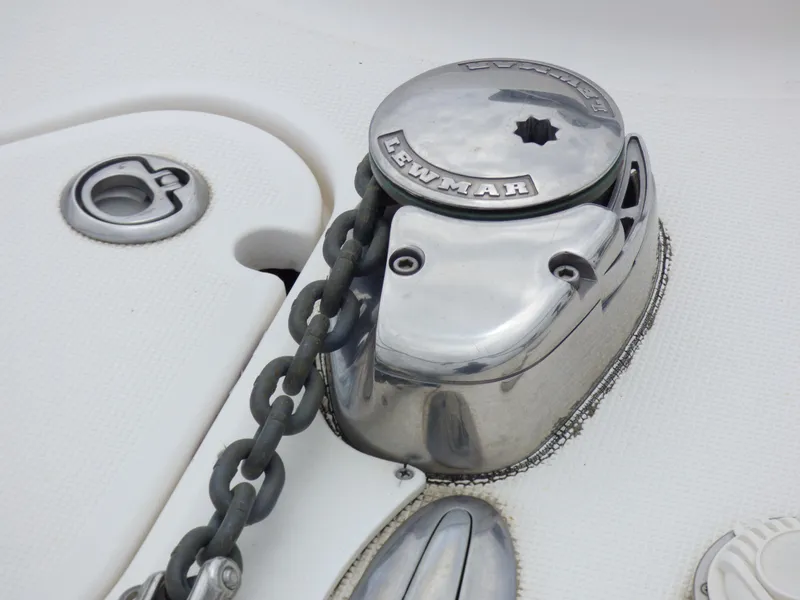 Slide: The Image of Anchor windlass on 2004 Robalo R265 Walkaround boat deck. - 14