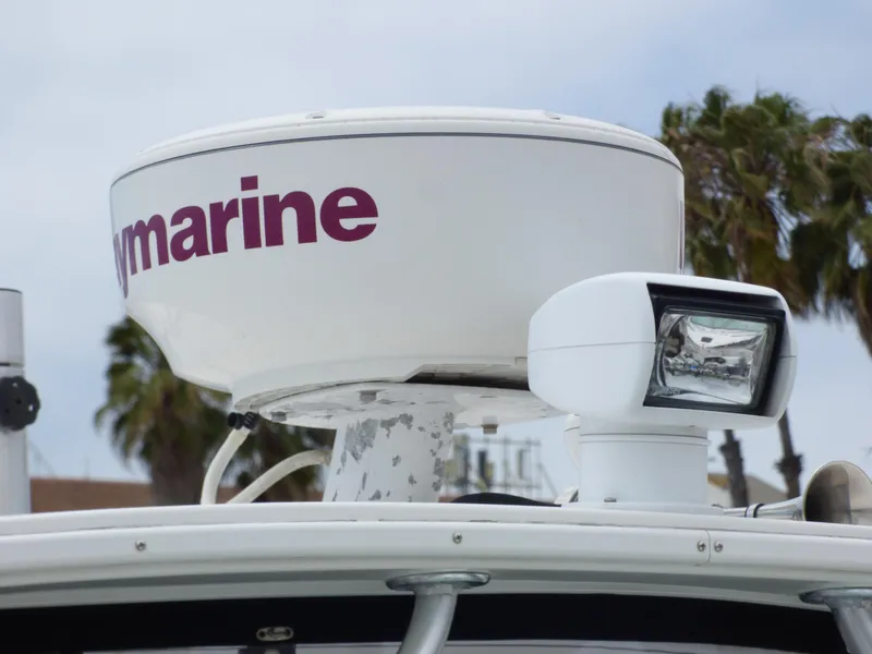 Slide: The Image of Radar and spotlight on 2004 Robalo R265 Walkaround boat. - 15