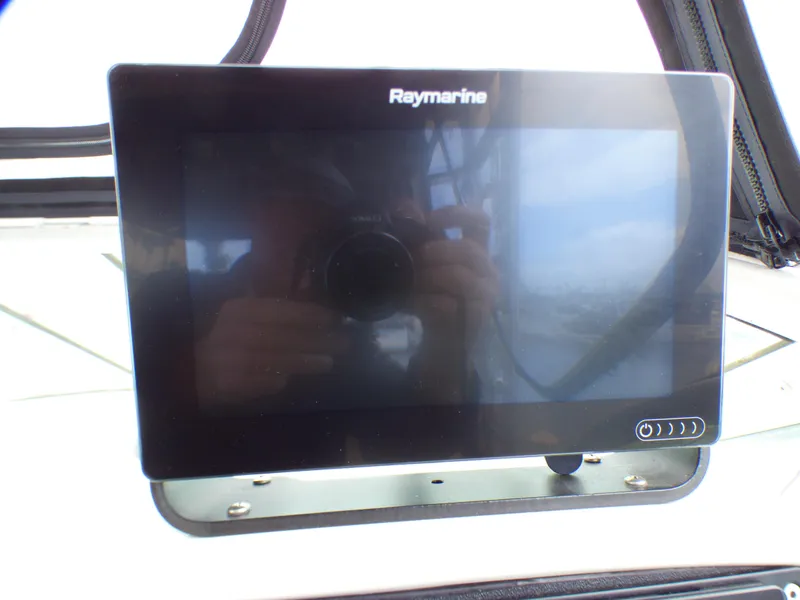 Slide: The Image of Raymarine display on 2004 Robalo R265 Walkaround boat dashboard. - 30