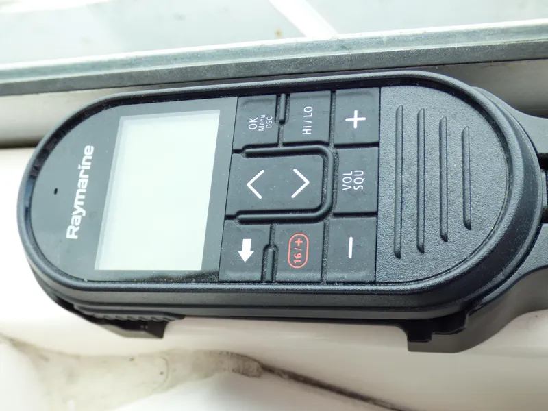 Slide: The Image of Raymarine marine remote control on a 2004 Robalo R265 Walkaround boat. - 35