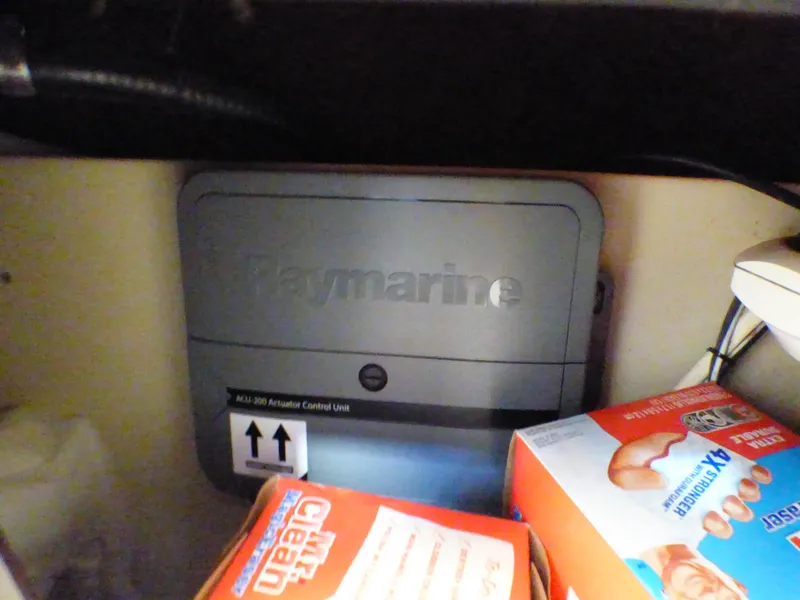 Slide: The Image of Keymarine control unit in 2004 Robalo R265 Walkaround boat storage compartment. - 39