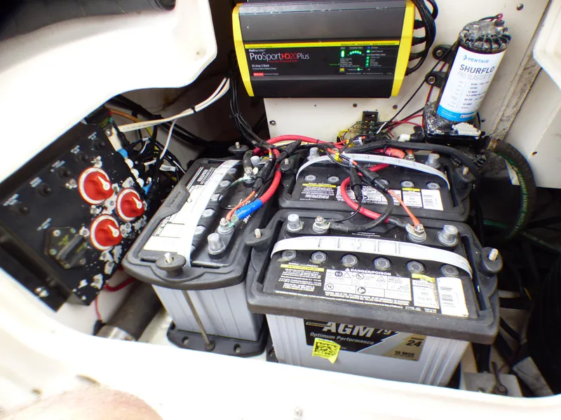 Slide: The Image of Electrical system of a 2004 Robalo R265 Walkaround boat with batteries and charger. - 41