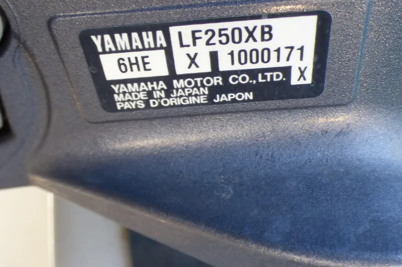 Slide: The Image of Yamaha LF250X engine label on 2004 Robalo R265 Walkaround boat, made in Japan. - 46