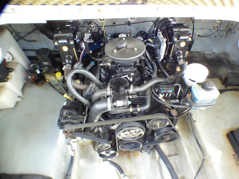 Slide: The Image of Engine of 2003 Sea Ray 260 Sundancer boat, showcasing mechanical components and layout. - 32