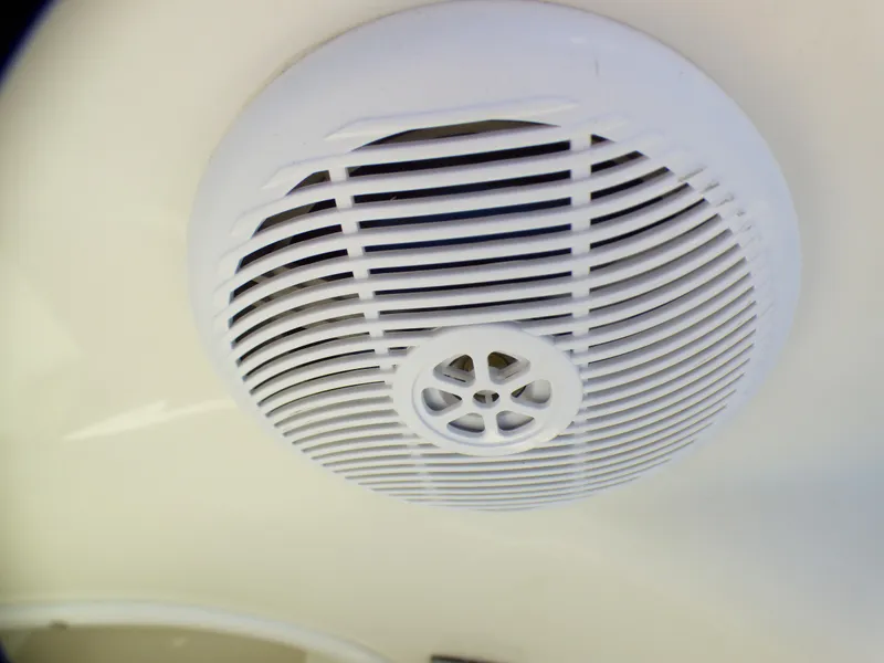 Slide: The Image of Boat speaker on 2003 Sea Ray 260 Sundancer, white grille, close-up view. - 43