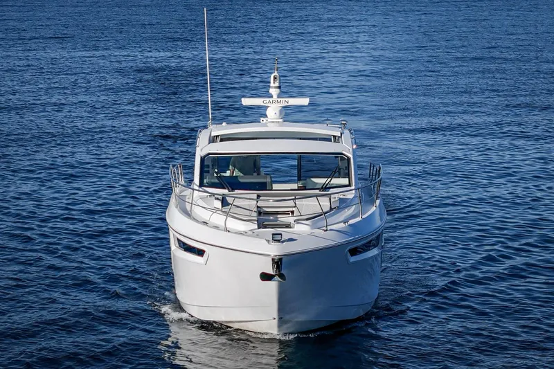 Slide: The Image of 2023 Cruisers Yachts 42 Cantius on open water, front view. - 4