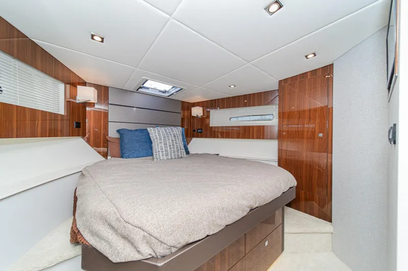 Slide: The Image of Luxurious bedroom interior of 2023 Cruisers Yachts 42 Cantius with modern design and cozy bedding. - 28