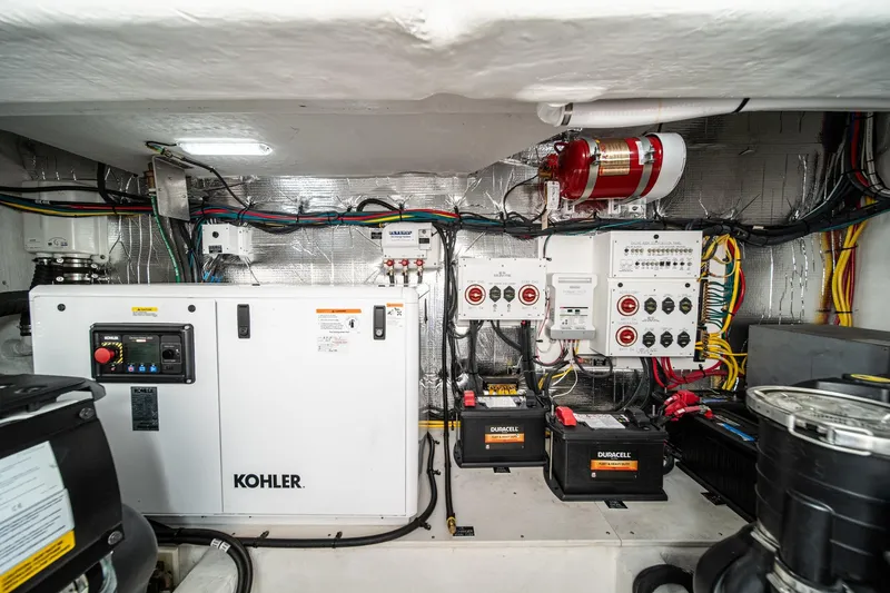 Slide: The Image of Engine room of 2023 Cruisers Yachts 42 Cantius with Kohler generator and electrical systems. - 41