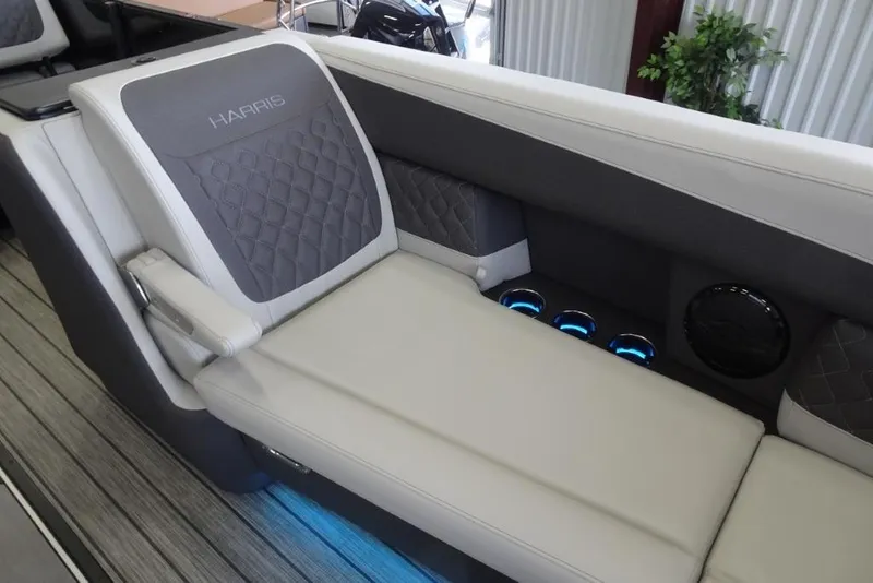 Slide: The Image of Luxurious seating on 2026 Harris Sunliner 250 boat with elegant design and ambient lighting. - 15