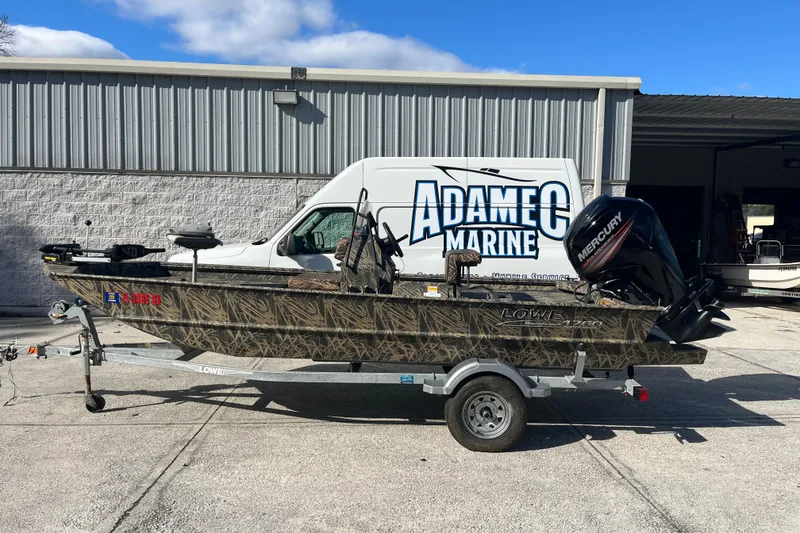 The Image of 2018 Lowe Roughneck 1760CC boat on trailer at Adamec Marine dealership. - 0