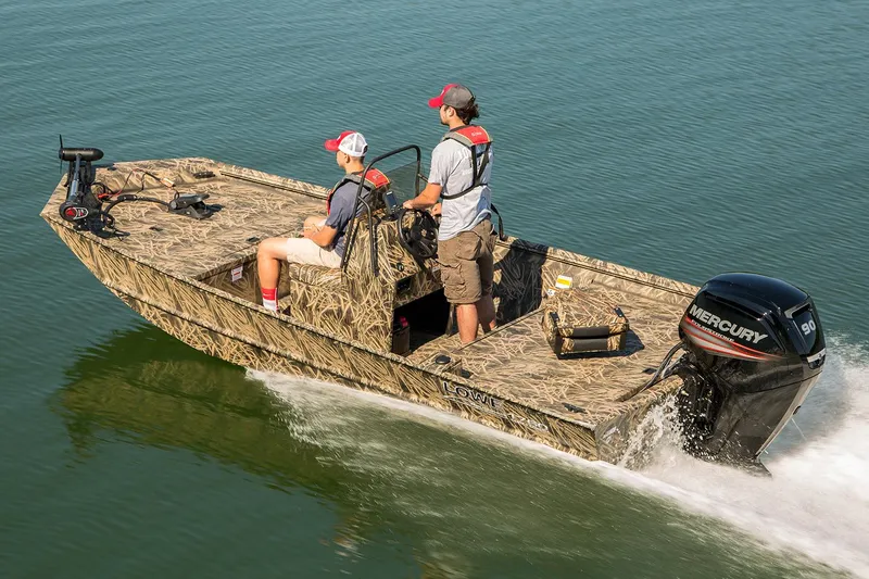 Slide: The Image of Manufacturer Provided Image: 2018 Lowe Roughneck 1760CC boat cruising on water with two passengers. - 12