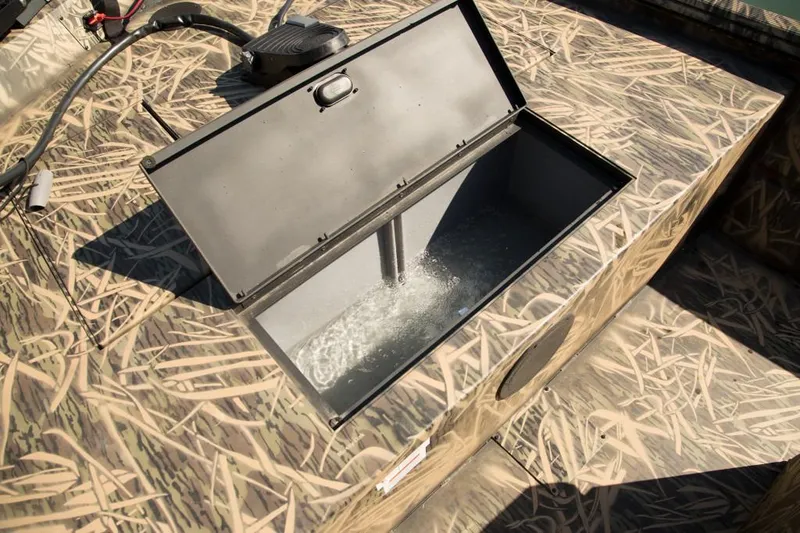 Slide: The Image of Manufacturer Provided Image: 2018 Lowe Roughneck 1760CC livewell with water filling, camo pattern deck. - 16