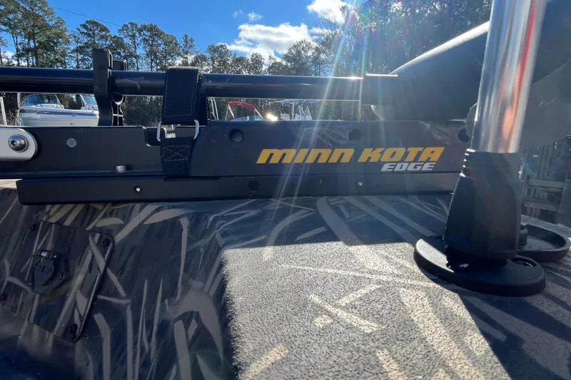 Slide: The Image of 2018 Lowe Roughneck 1760CC with Minn Kota Edge trolling motor in sunlight. - 27