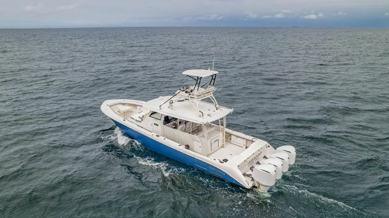 Slide: The Image of 2015 Everglades 435 Center Console on open sea. - 2