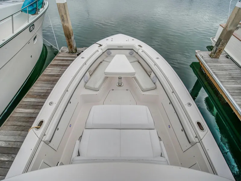 Slide: The Image of 2015 Everglades 435 Center Console boat docked at marina. - 20
