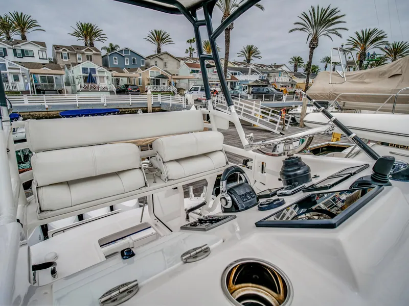 Slide: The Image of Interior view of a 2015 Everglades 435 Center Console boat in harbor. - 23