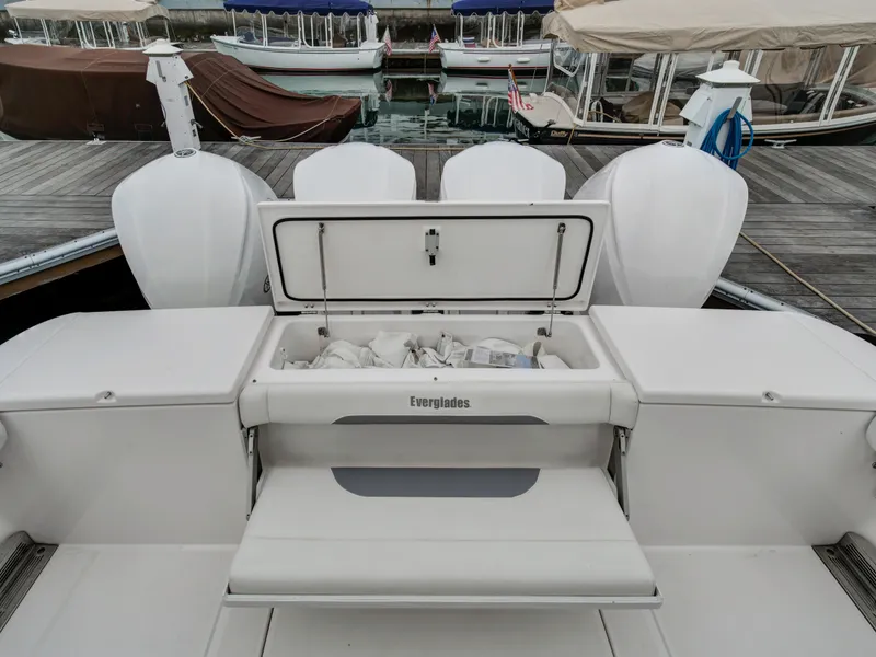 Slide: The Image of 2015 Everglades 435 Center Console with open storage at dock. - 5