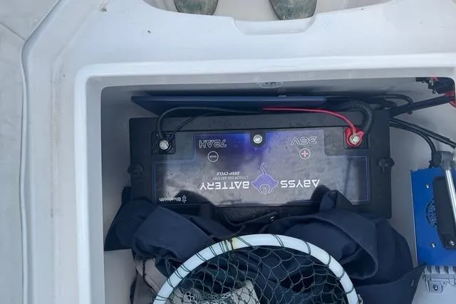 Slide: The Image of Battery compartment of a 2017 Regulator 25 boat with accessories. - 36