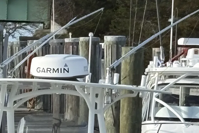 Slide: The Image of 2014 Regulator 25 boat with Garmin radar at dockside. - 26