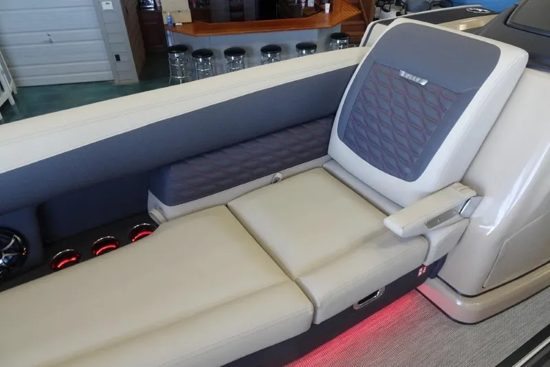 Slide: The Image of Luxurious seating on 2026 Harris Sunliner 250 Sport boat with stylish upholstery and ambient lighting. - 10