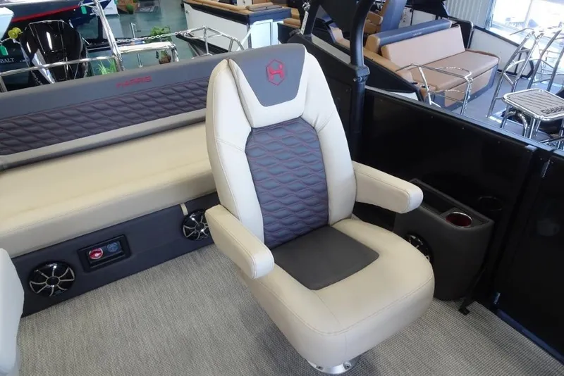 Slide: The Image of Luxurious seating on 2026 Harris Sunliner 250 Sport boat with stylish design and comfort. - 14