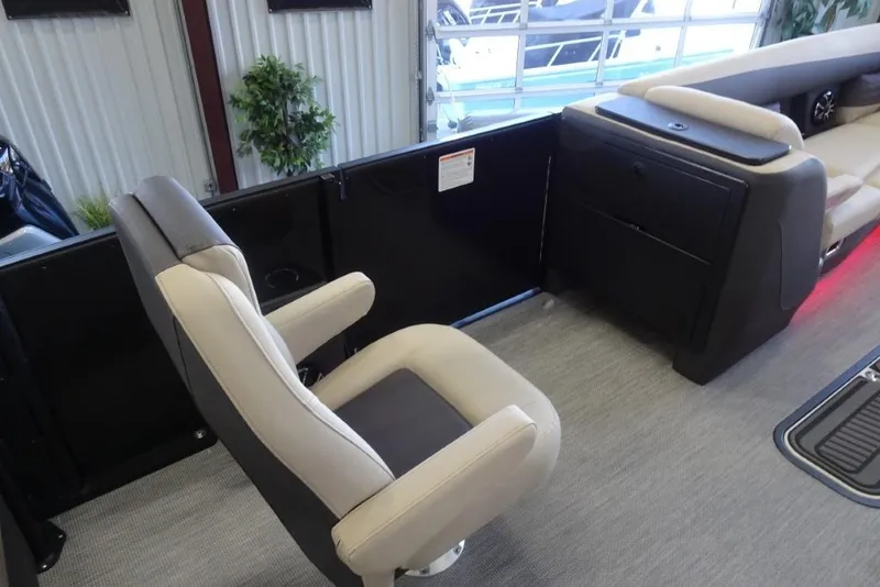 Slide: The Image of 2026 Harris Sunliner 250 Sport interior with modern seating and sleek design. - 19