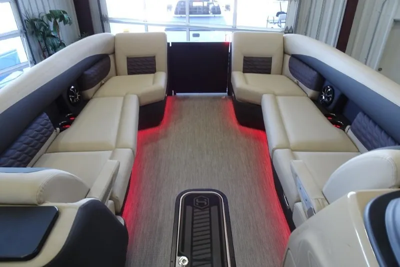 Slide: The Image of Luxurious interior of 2026 Harris Sunliner 250 Sport with ambient red lighting. - 28