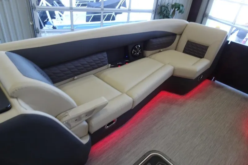 Slide: The Image of Luxurious seating in 2026 Harris Sunliner 250 Sport with ambient red lighting. - 30