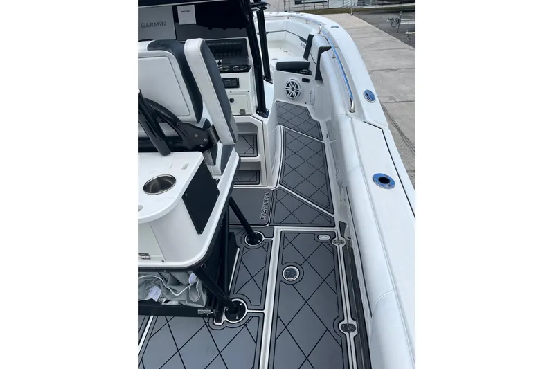 Slide: The Image of 2021 Blackfin 252 CC boat interior with sleek design and modern features. - 14