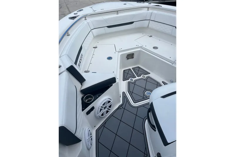 Slide: The Image of 2021 Blackfin 252 CC boat interior with cushioned seating and modern design. - 17