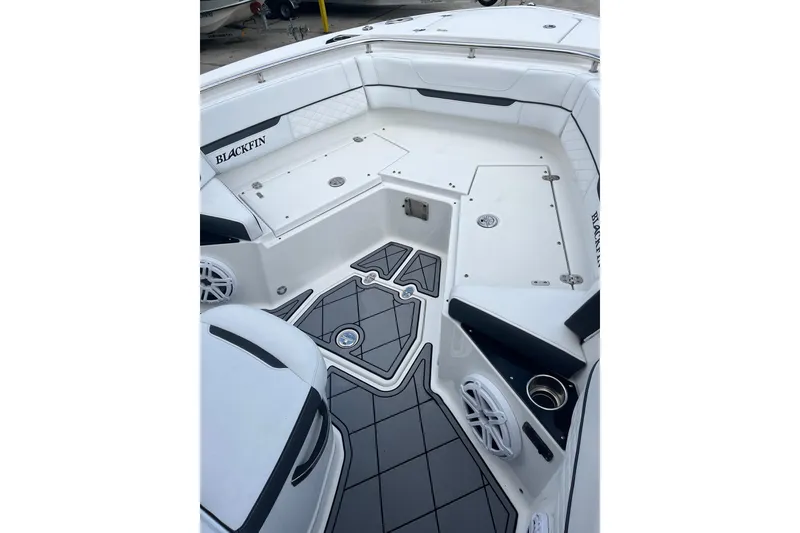 Slide: The Image of 2021 Blackfin 252 CC boat interior with sleek seating and modern design. - 18
