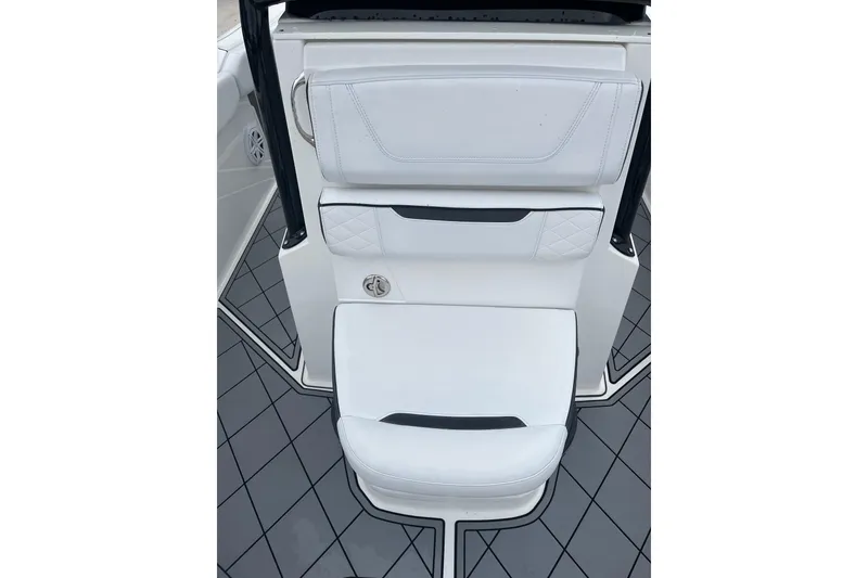 Slide: The Image of 2021 Blackfin 252 CC boat seat with white upholstery and sleek design. - 22