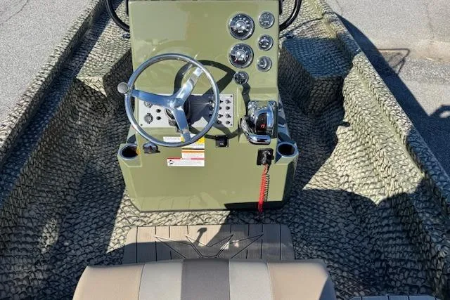 Slide: The Image of 2026 Vexus ACX 2000 boat interior with steering wheel and control panel. - 11